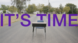 It's Time with image of empty desk in middle of street